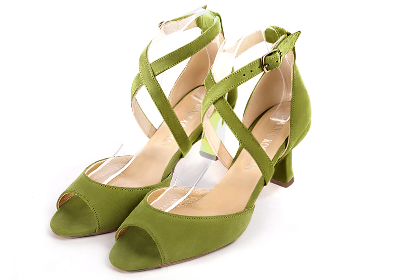 Pistachio green women's closed back sandals, with crossed straps. Square toe. Medium spool heels. Front view - Florence KOOIJMAN